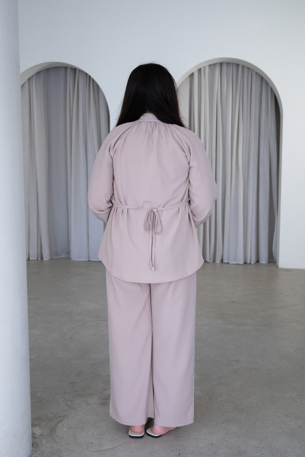 Elegant and effortlessly modest, The Liyana Set is a timeless two-piece outfit designed for comfort and style. Featuring a longline blouse with delicate pearl-look buttons and softly gathered sleeves, paired with relaxed wide-leg pants, it’s perfect for Eid, special occasions, family gatherings and everyday wear.