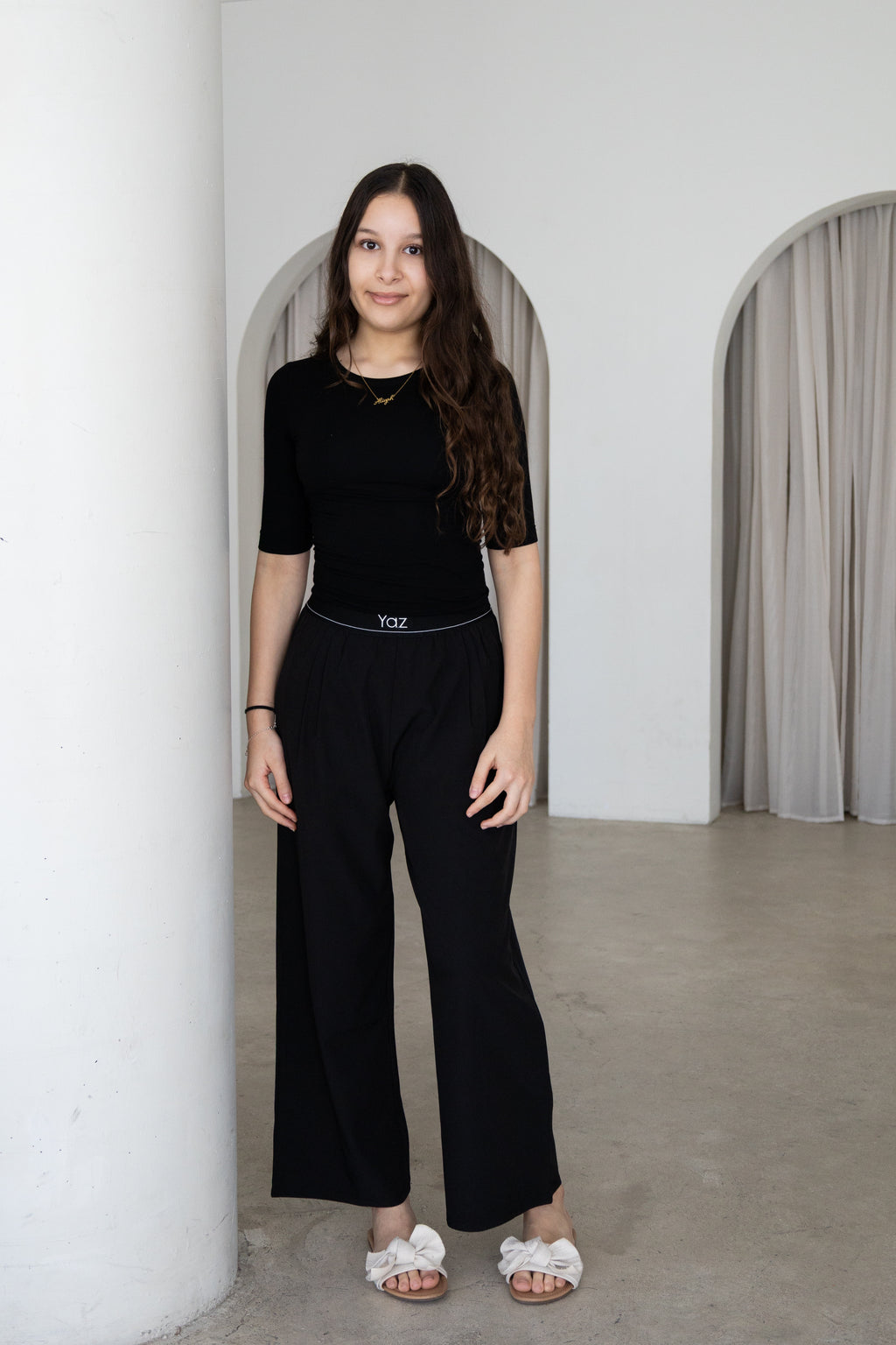 Elegant and versatile, The Noor Top is a timeless modest wardrobe essential designed for effortless everyday style. Featuring a fitted silhouette, classic round neckline and elegant three-quarter sleeves, it pairs beautifully with The Yaz Pants or any Yaz & Co. piece for endless styling options.