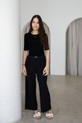 Elegant and versatile, The Noor Top is a timeless modest wardrobe essential designed for effortless everyday style. Featuring a fitted silhouette, classic round neckline and elegant three-quarter sleeves, it pairs beautifully with The Yaz Pants or any Yaz & Co. piece for endless styling options.