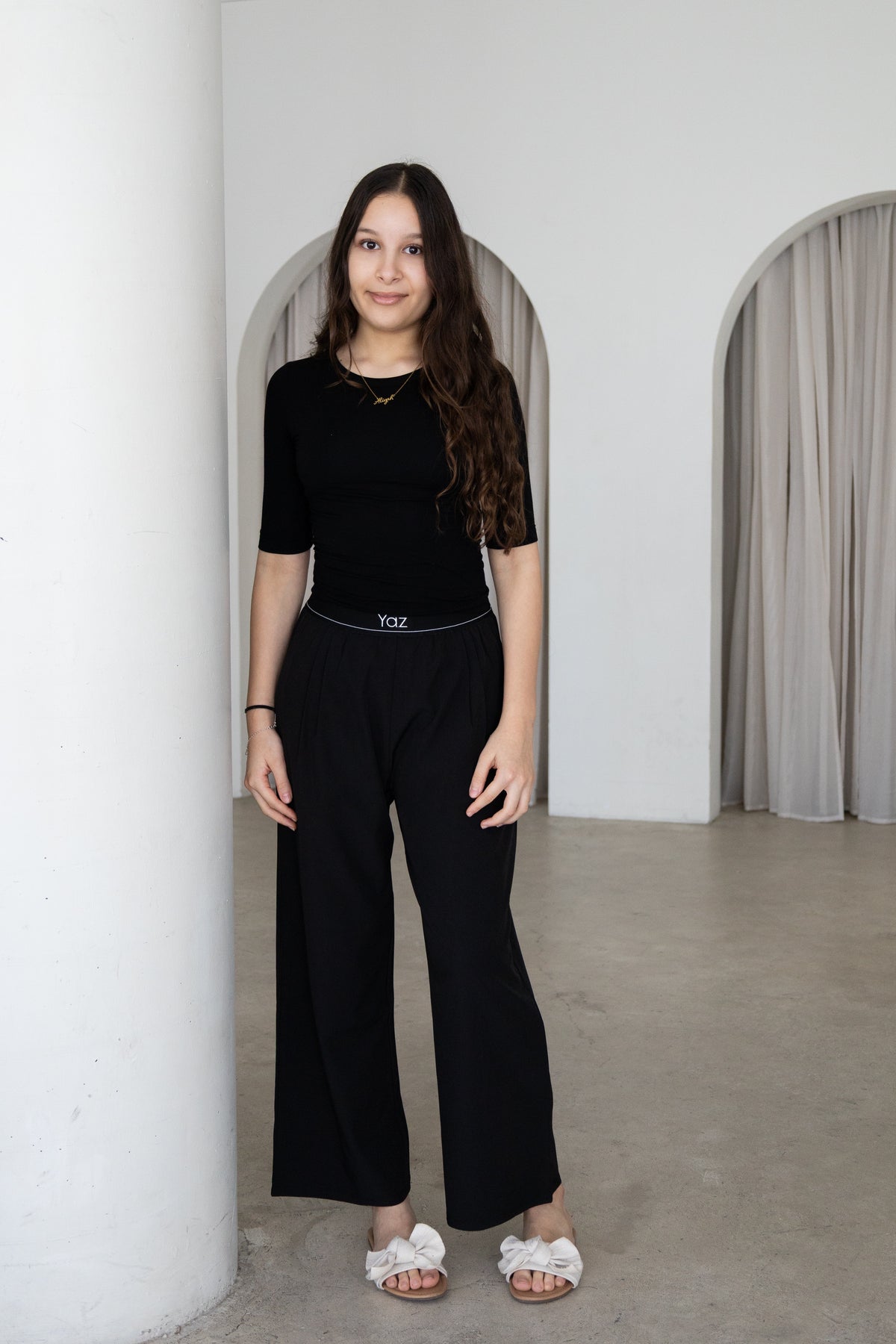 Elegant and versatile, The Noor Top is a timeless modest wardrobe essential designed for effortless everyday style. Featuring a fitted silhouette, classic round neckline and elegant three-quarter sleeves, it pairs beautifully with The Yaz Pants or any Yaz & Co. piece for endless styling options.