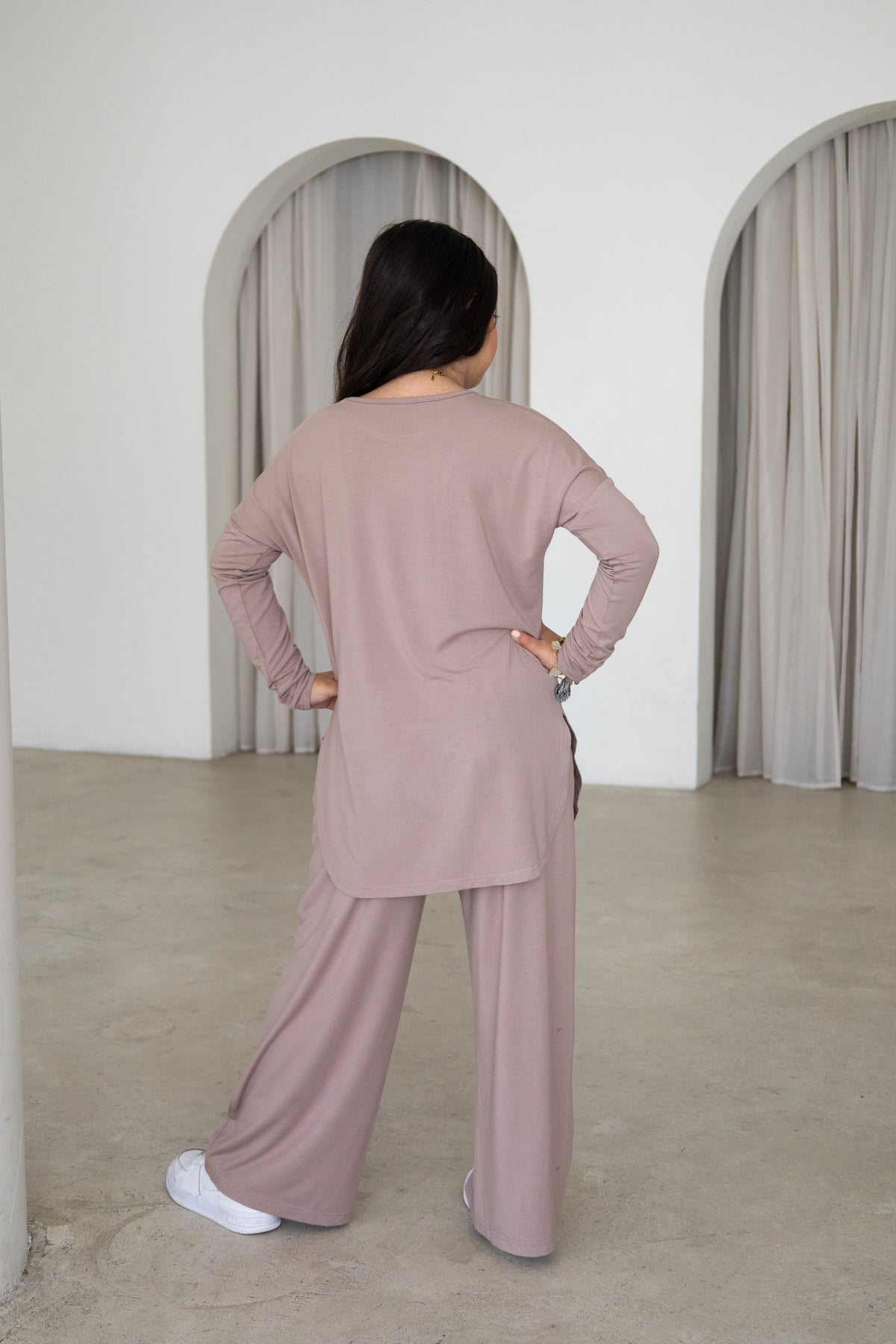 Effortless and modest, The Yasmin Set is a timeless two-piece outfit designed for comfort and everyday style. Featuring a relaxed longline tunic and flowing wide-leg pants in a versatile mocha hue, it’s perfect for Eid, family gatherings, outings and everyday wear.