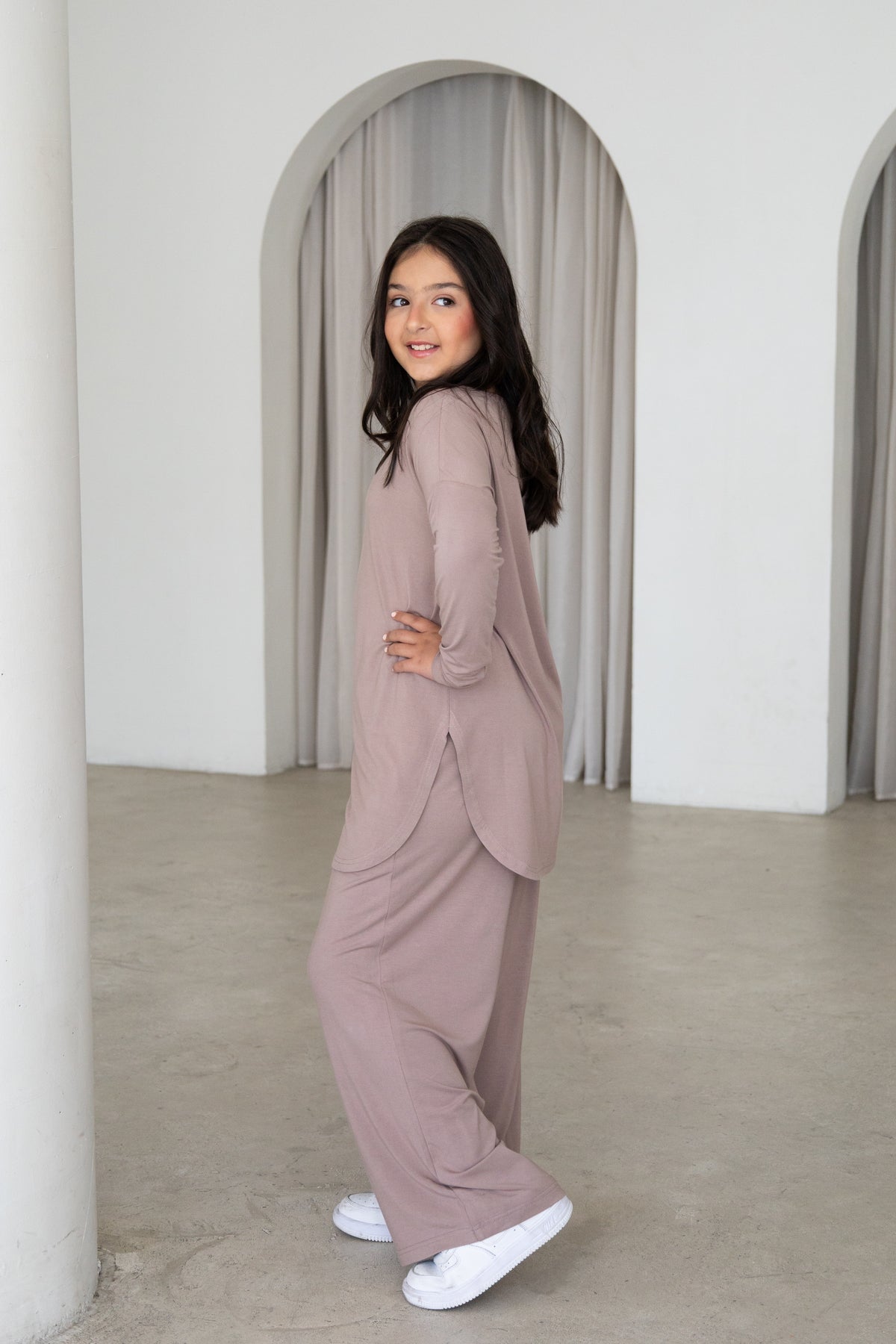 Effortless and modest, The Yasmin Set is a timeless two-piece outfit designed for comfort and everyday style. Featuring a relaxed longline tunic and flowing wide-leg pants in a versatile mocha hue, it’s perfect for Eid, family gatherings, outings and everyday wear.